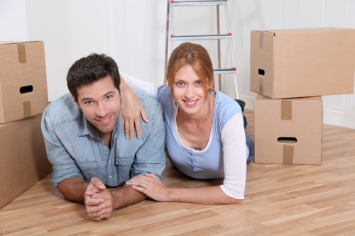 Family settling into their new home in Thames Ditton after removal