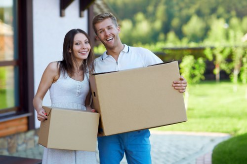 Professional movers assisting with packing in Uxbridge