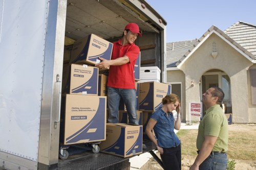 Loading household goods into a moving truck in Oakleigh Park