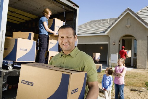 Packed household items ready for transport in Willesden